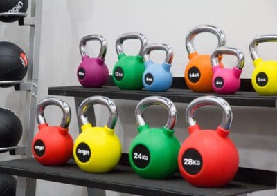 Colourful weights on a rack at Club Cheadle Hulme.